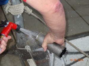 Cleaning the basket with the hose. Good thing we have good water pressure here :)