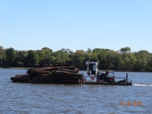 Barge with logs