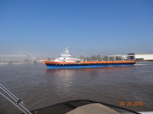 Crew Boat leaving Mobile Bay Harbor. They travel from oil rig to oil rig bringing supplies, parts and crew
