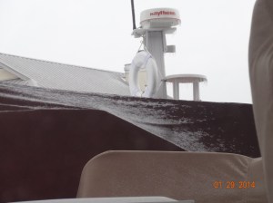 Frozen water on our dingy cover