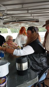 The lovely red headed wench in the back ground was the host of the party.....his name is Mark!