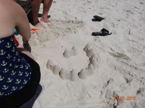 I think Mommy and Daddy had more fun with the sand than he did