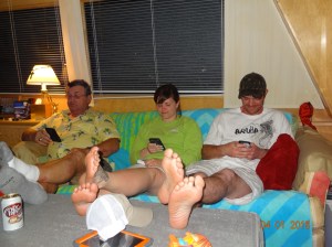 Their feet are all crossed the same way too.