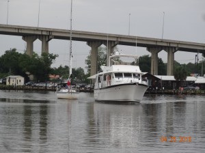 Sail boat being towed in