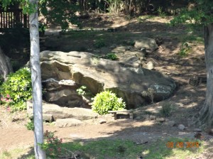 This rock formation is in someone's front yard