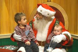 Who is that bearded man and his two little elves?